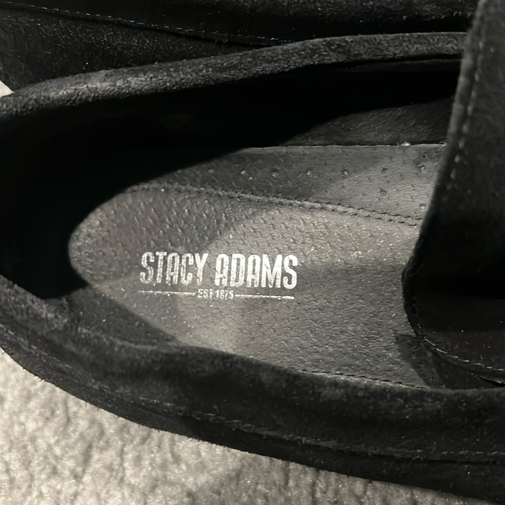 Used condition but fairly good. No scuffs black side size 9.5 Stacy Adam's men's